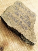 A rock I pulled from a stream at Mt. Pisgah. It now rests on my prayer altar in my home.